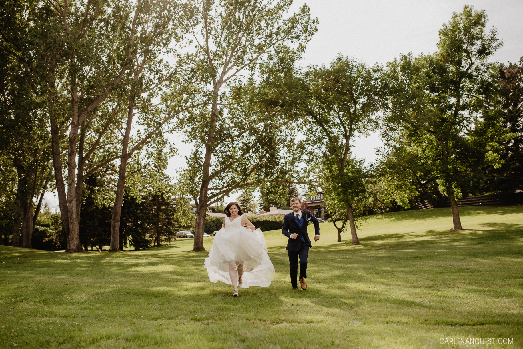 Bride & Groom Running | Confederation Park Wedding