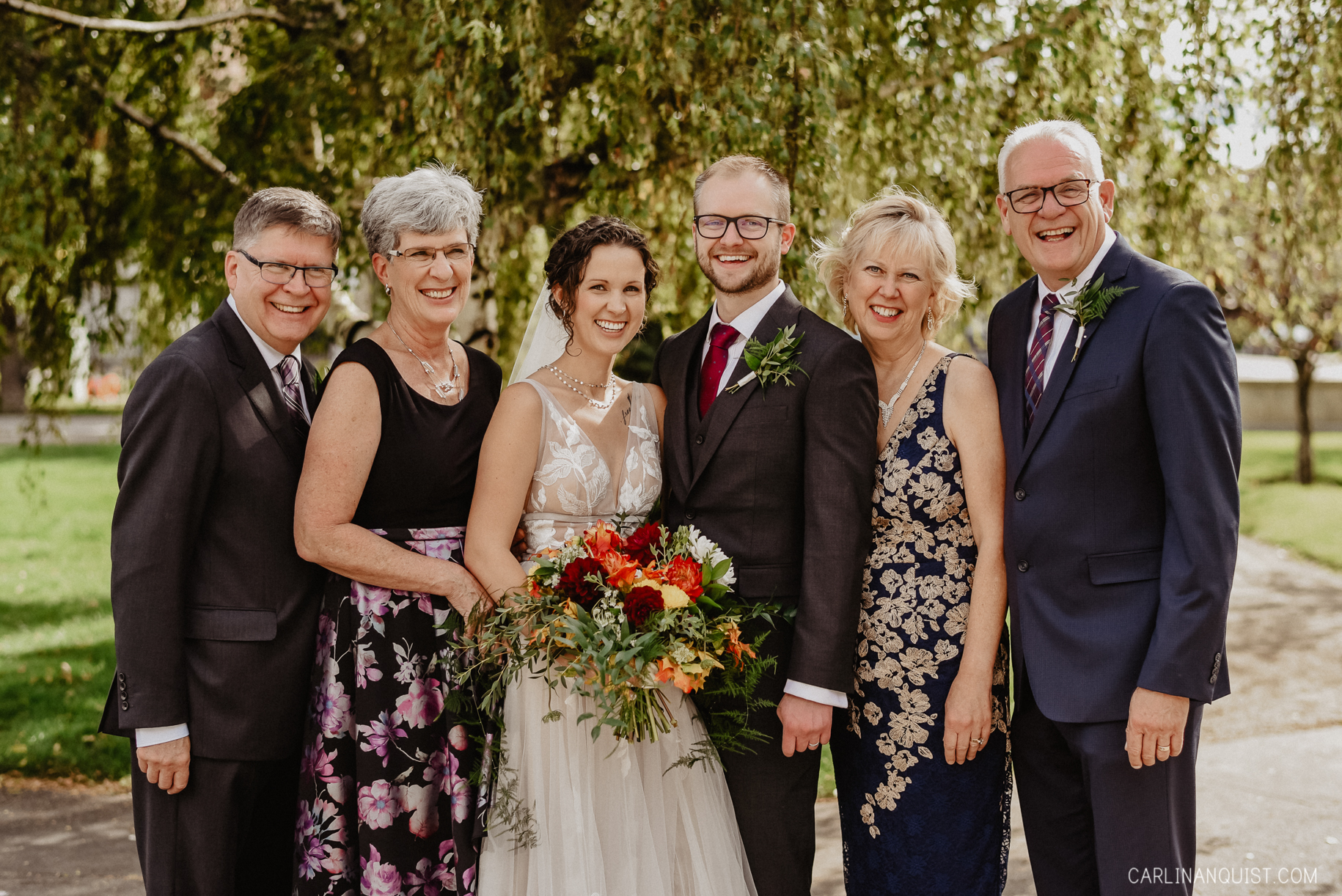 Bride & Groom with Parents | Calgary Wedding Photographer